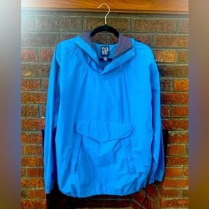 Vintage Gap nylon rain jacket pullover in blue with a navy blue hood. Size L.